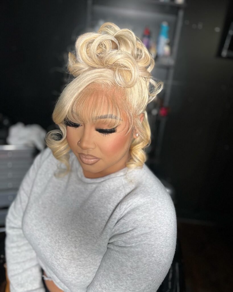 Blonde Curly Messy High Bun With See-Through Bangs