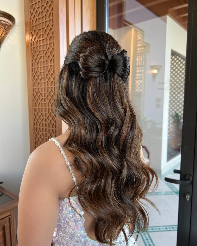 Half Up Half Down Bow Hairstyle With Wavy Brown Balayage