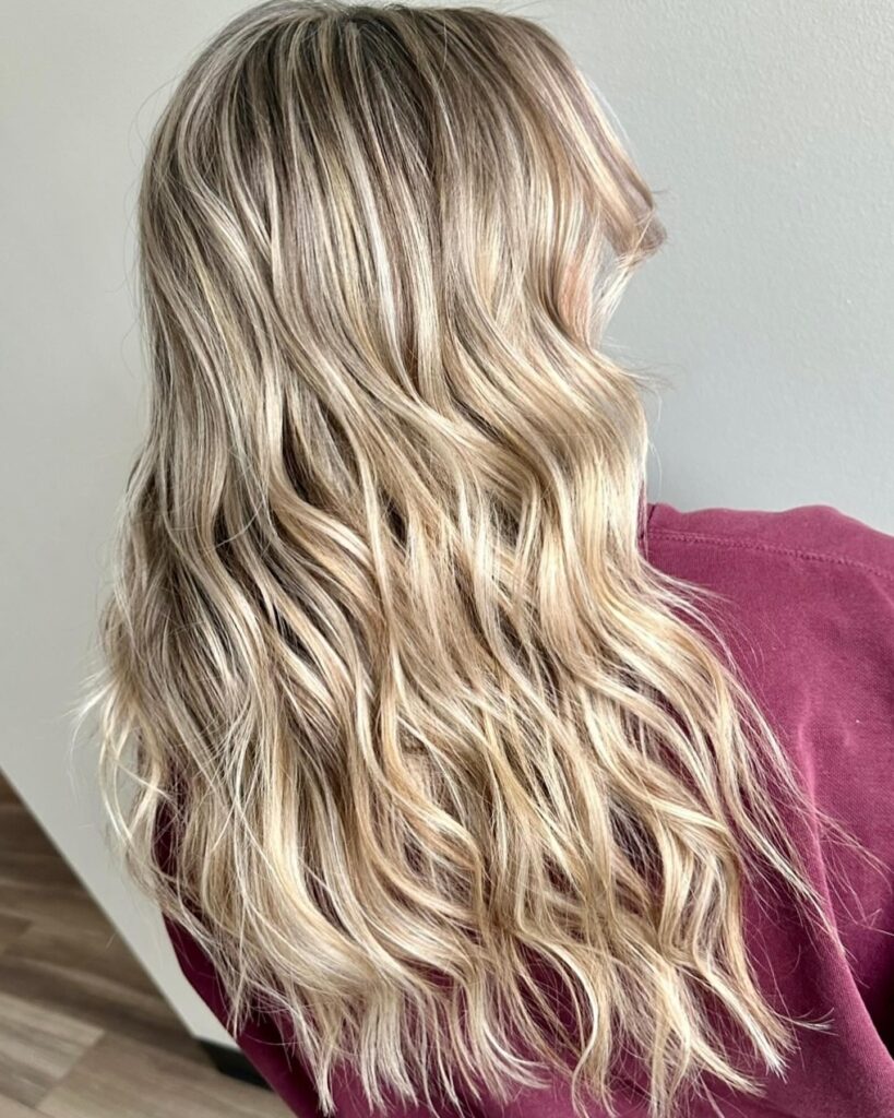 Voluminous Curls With Golden Highlights