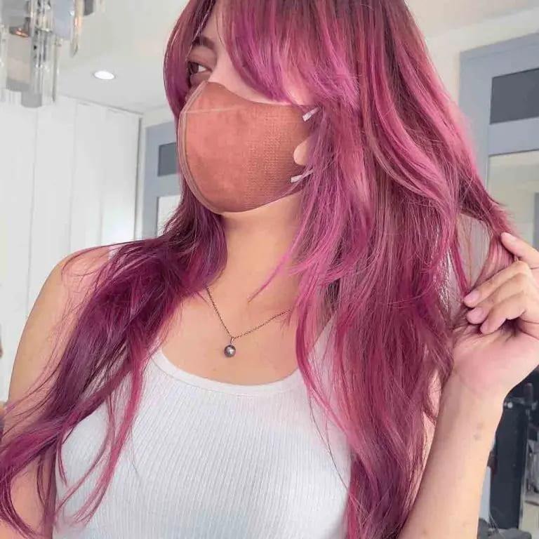 Long Dramatic Purple Pink Wolf Cut With Side-Swept Bangs