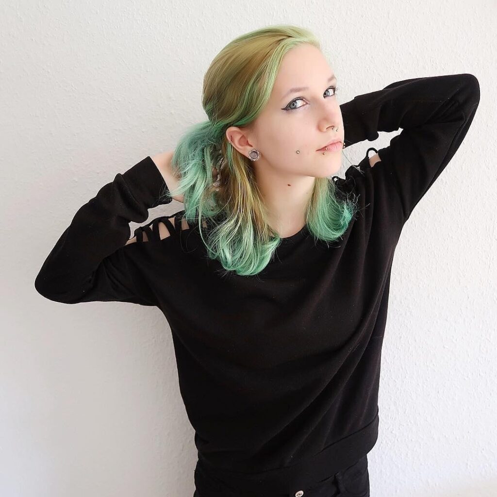 Medium Blonde Green Scene Hairstyle