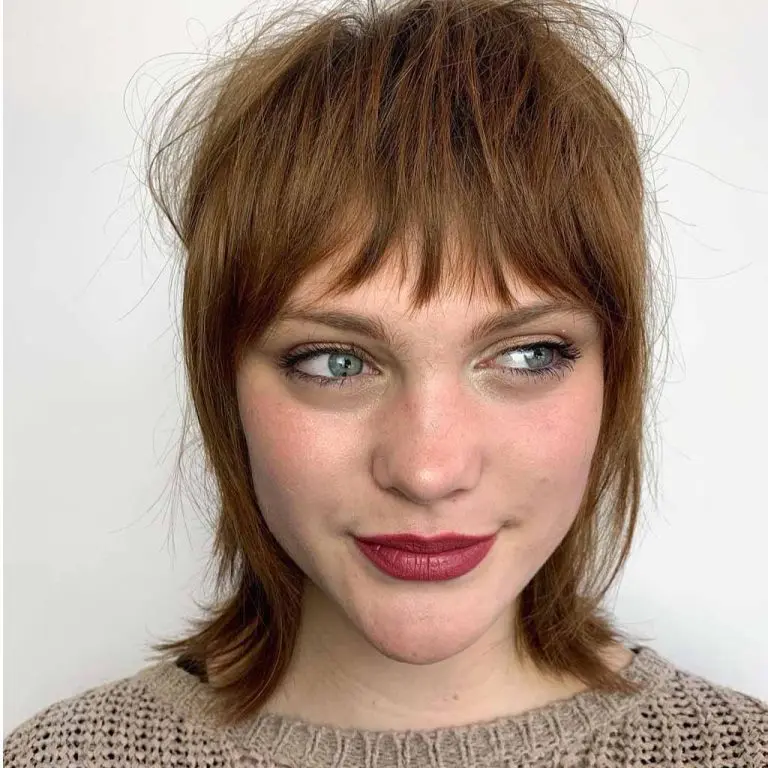 Textured Razor Shag Haircut With Asymmetric Bangs