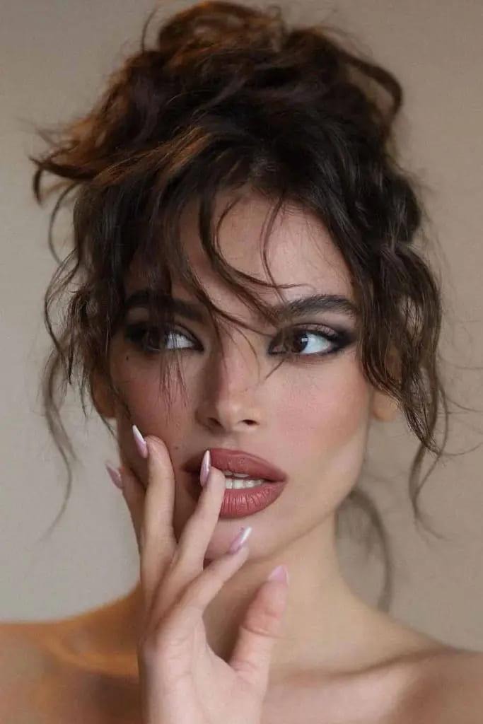 Messy Updo With Loose Waves