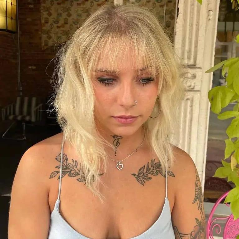 Medium Wolf Cut With Soft Choppy Bangs on Blonde Hair