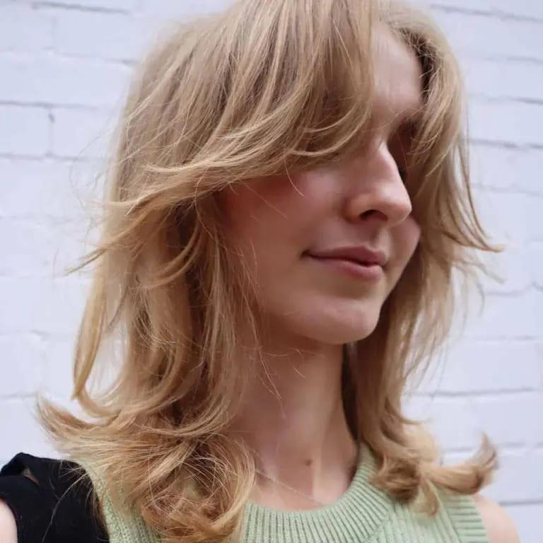 Blonde Wavy Medium Wolf Cut With Bottleneck Curtain Bangs