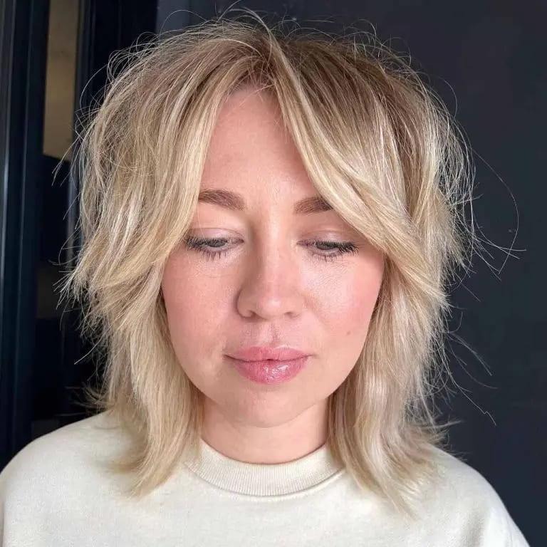Messy Short Blonde Wolf Cut With Curtain Bangs