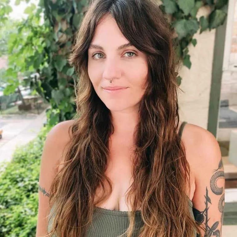 Wavy Wolf Cut With Curtain Bangs on Chocolate Brown Hair