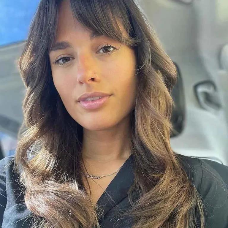 Wavy Golden Brown Wolf Cut With Curtain Bangs