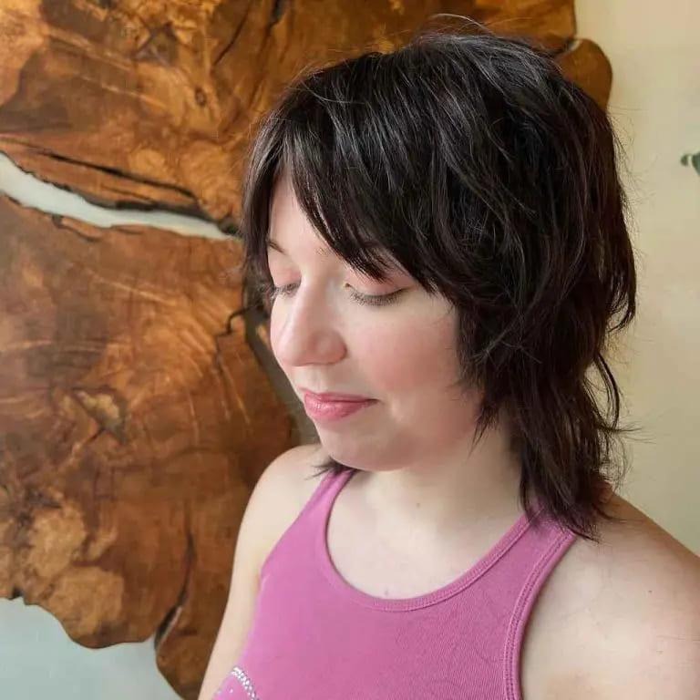 Black Layered Choppy Mullet Wolf Cut With Short Curtain Bangs