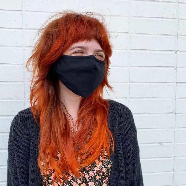 Long Messy Multi-Shade Ginger Wolf Cut With Short Asymmetric Bangs