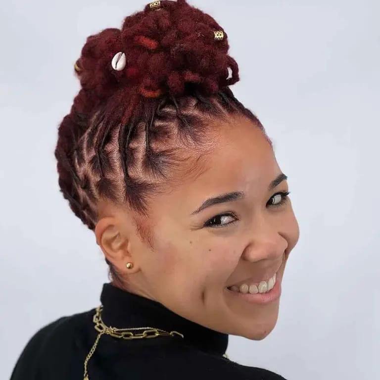 Boxed Red Dreadlocks Tied Up in a Top Bun
