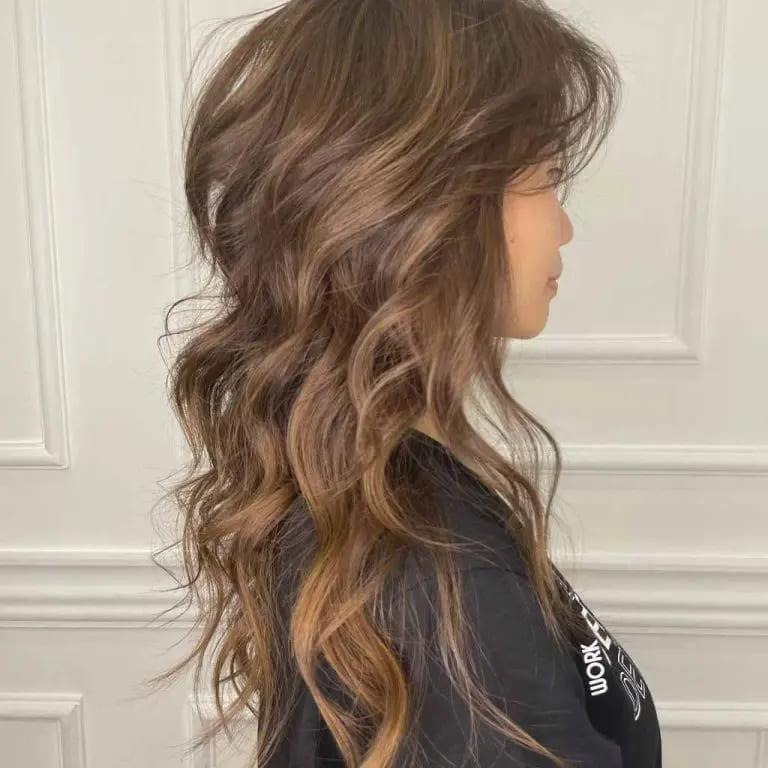 Long Wavy Wolf Cut With Fall Bronde Balayage