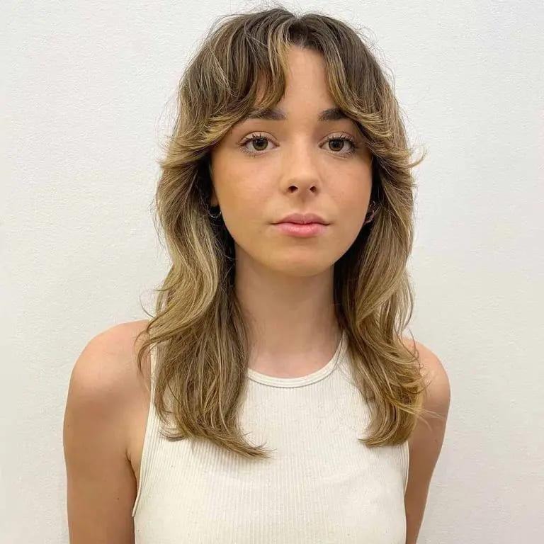 Wavy Soft Shag Wolf Cut With Balayage and Wavy Curtain Bangs
