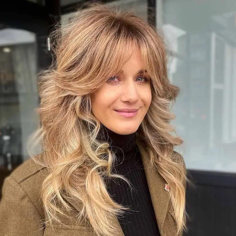 Long Multi-Textured Wolf Cut With Balayage and Curtain Bangs
