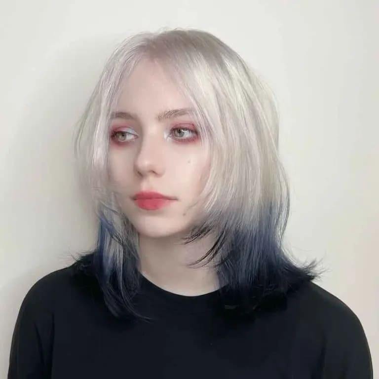 Short Ice Blonde Wolf Cut With Navy Blue Chunks