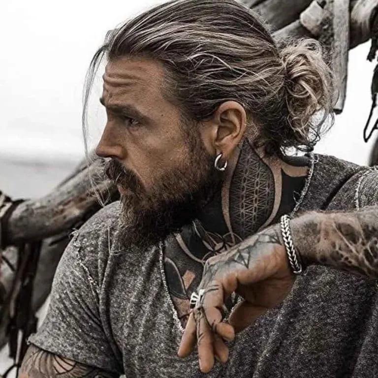 Viking Style Dark Man Bun With Blonde Highlights