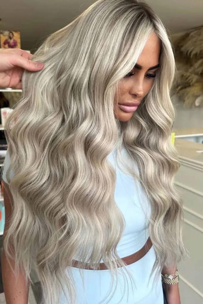 Luxurious Blonde Curls With Dimensional Low Lights