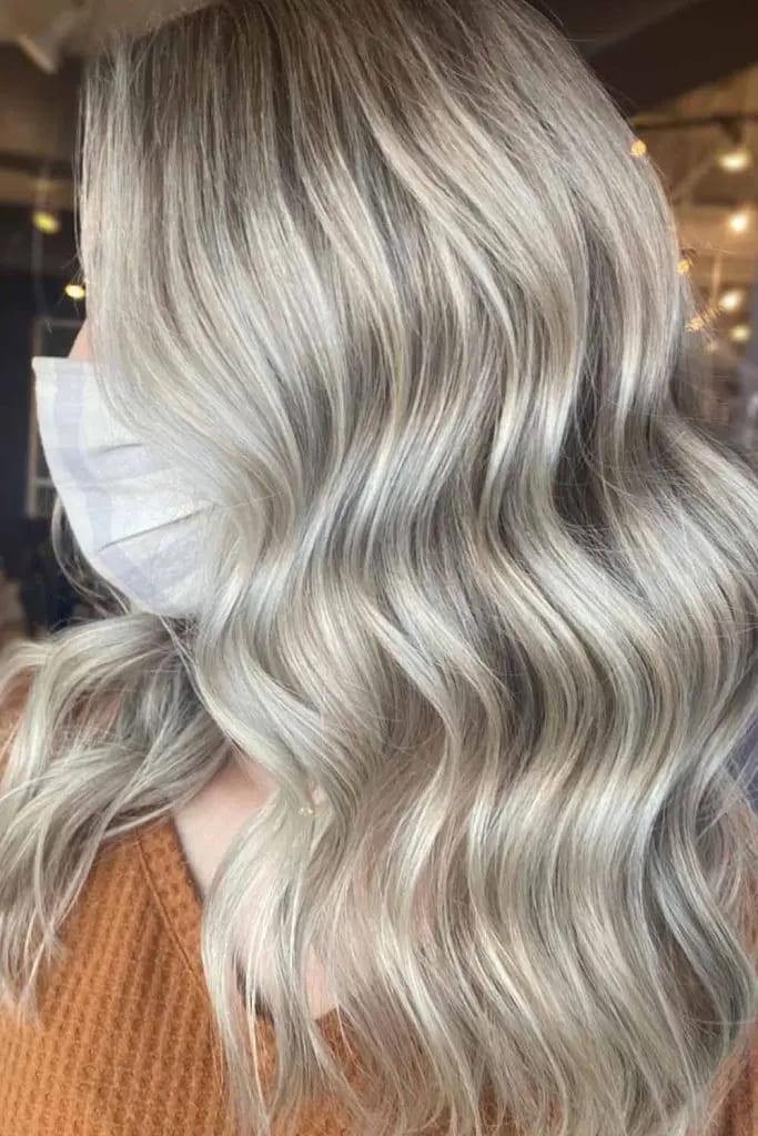Elegant Blonde Waves Enhanced With Low Lights
