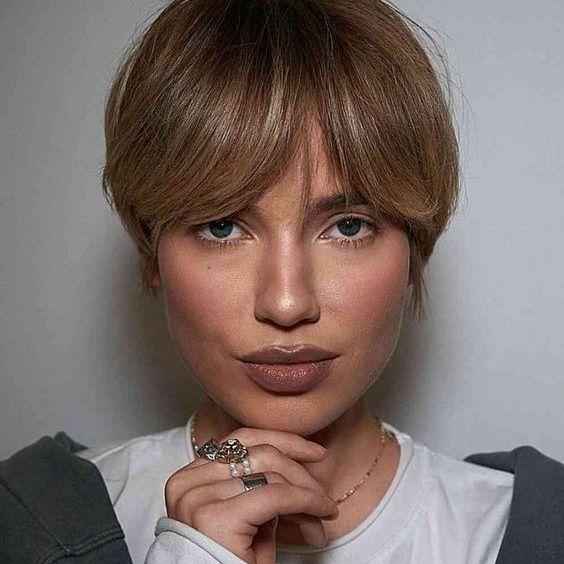 Pixie Haircut With Silver Highlights and Wispy Bangs