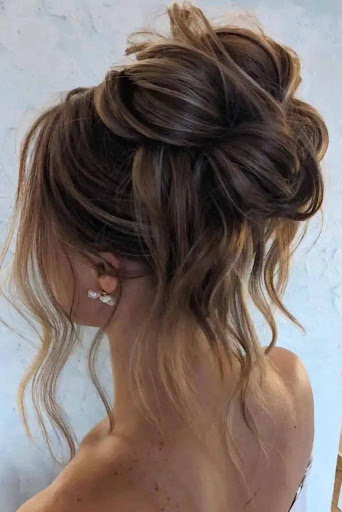 Messy Brunette Updo With Blonde Highligthts