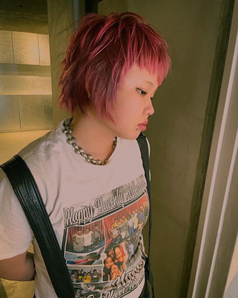 Very Short Pink Shag Cut With Asymmetric Micro Bangs