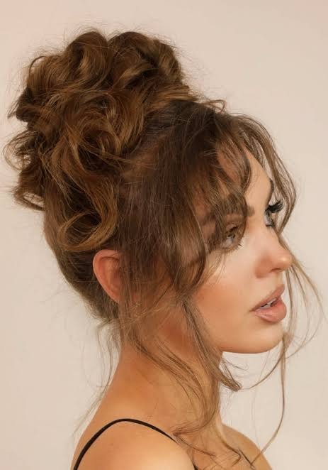 Fiery Voluminous Messy Updo