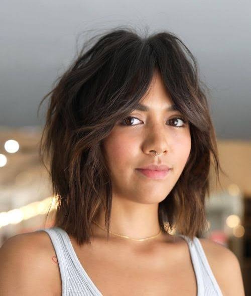 Tousled Shoulder-Length Shag with Curtain Bangs