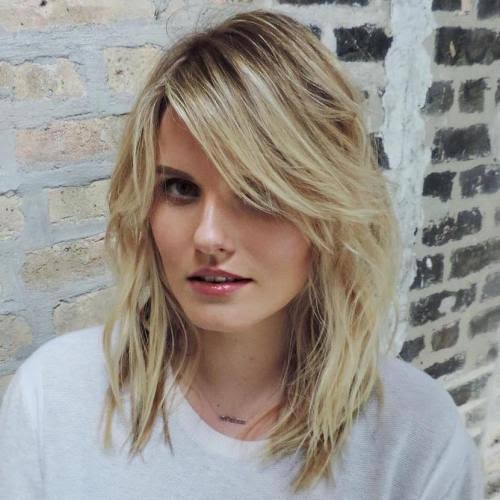 Sleek Shoulder-Length Hair with Side-Swept Bangs