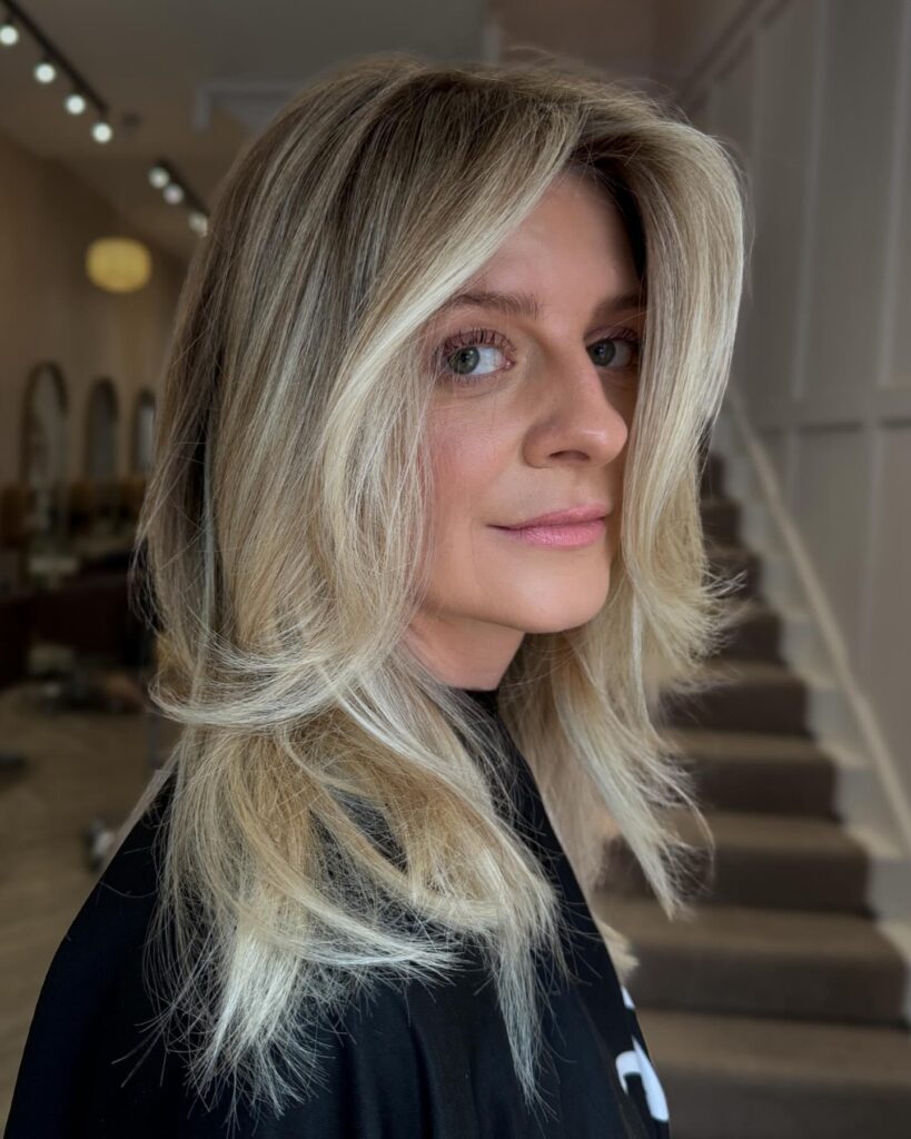 Sun-Kissed Brunette Balayage on Long Wavy Hair