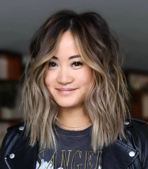 Wavy Lob with Subtle Honey Highlights