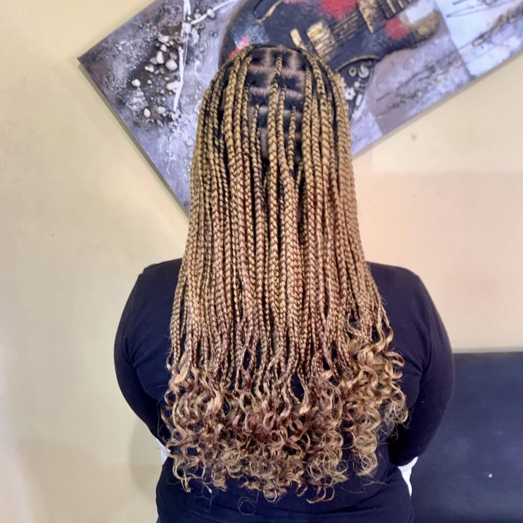 Blonde Knotless Braids With Curls