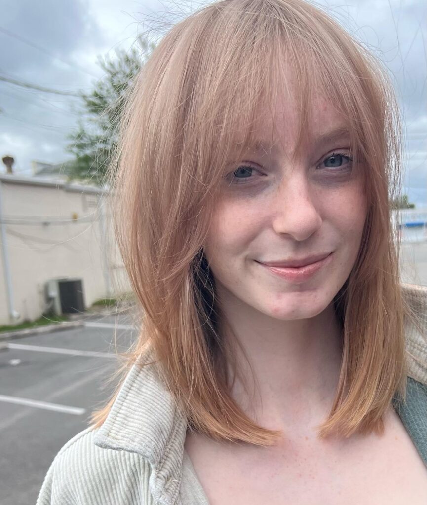 Long Textured Grey Gypsy Shag Cut With Blunt Bangs