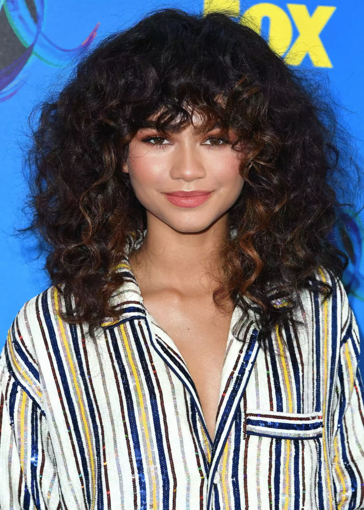 Defined Curls with Mahogany Brown Accents